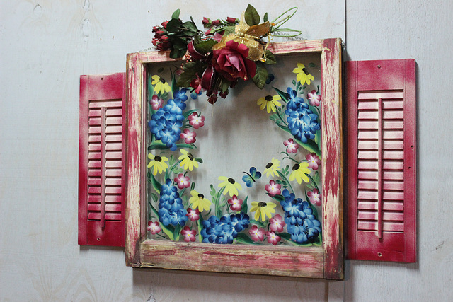 Very unique rustic wall decor in a friend's out door kitchen / pool house. !   SHE made this. :)