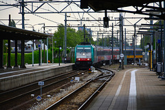 NMBS engine 2803 arriving with colourful train at Dordrecht