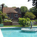 Fountain and Brick Cottage in the Italian Garden at Planting Fields, May 2012