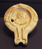 Lamp with a Theatrical Mask in the Archaeological Museum of Madrid, October 2022