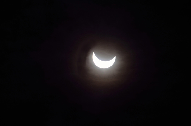 Partial eclipse of the sun. Milan, March 20, 2015, at 10 and 24 minutes