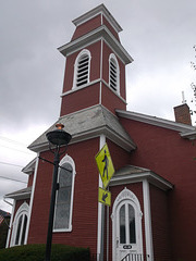 Religious pedestrian yellow sign
