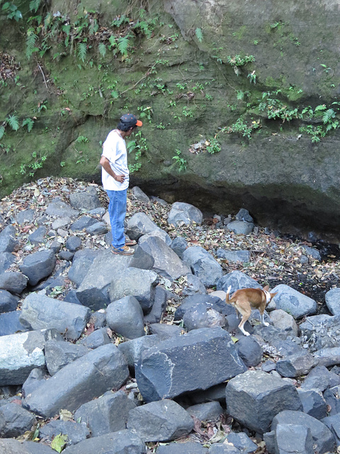 Guide & his dog in the river bed