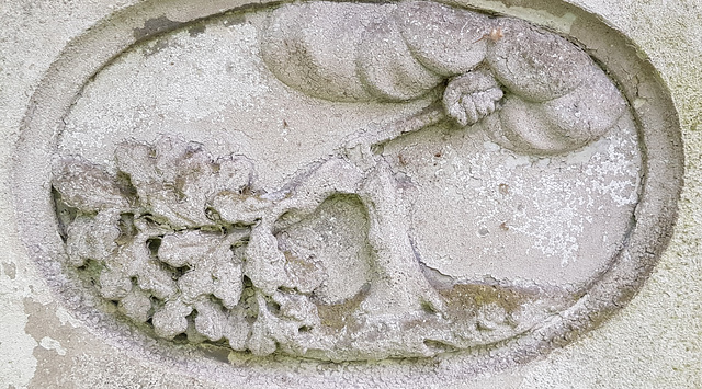 god with axe on  c19 gravestone of william foster +1860 at abney park cemetery