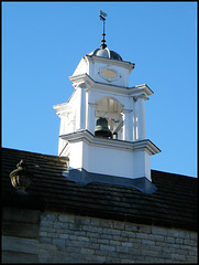 school bell and weathervane