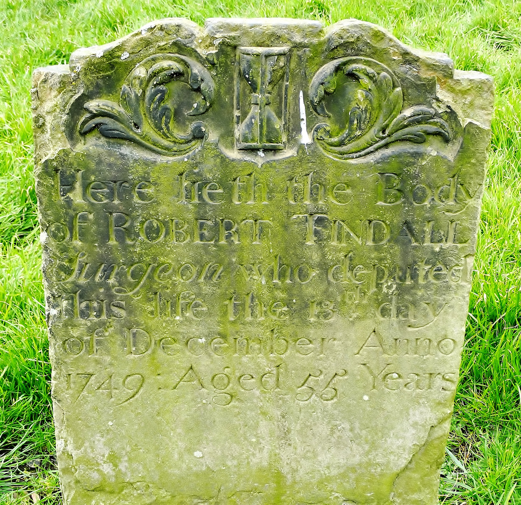 Gravestones at St Mary's Church Gateshead. Many of them are 300 years old yet the carving has survived so clearly on a majority. Only the very wealthy could afford a gravestone.