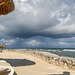 beach sea clouds fence and legs