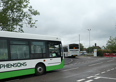 Stephensons 432 (EU10 NVR) and Coach Services DX12 OVZ at the Mildenhall Hub - 19 Jun 2021 (P1080665)