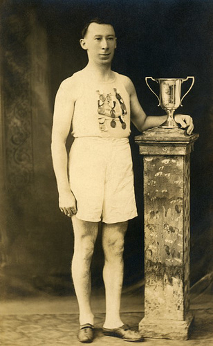 Athlete with Trophy and Medals