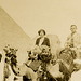 Tourists on Camels Near the Sphinx and Great Pyramid, Giza Necropolis, Cairo, Egypt (Cropped)