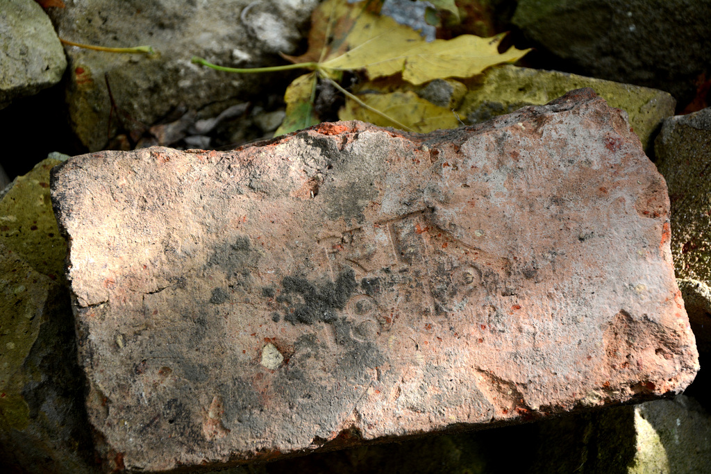 Ukraine, Kiev, Brick from the destroyed wall of the old cemetery on the Castle Hill