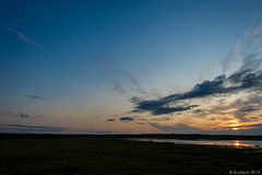 Sonnenuntergang im Naturschutzgebiet Liminganlahti (© Buelipix)