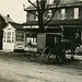 An Amishman and His Buggy at Zimmerman's Store, Intercourse, Pa.