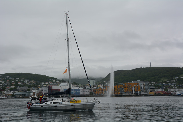 Norway, Yacht is Leaving the Port of Harstad