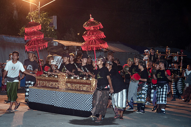 Gamelan music ensemble enters the scene