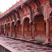 Red sandstone colonnade in the outer wall