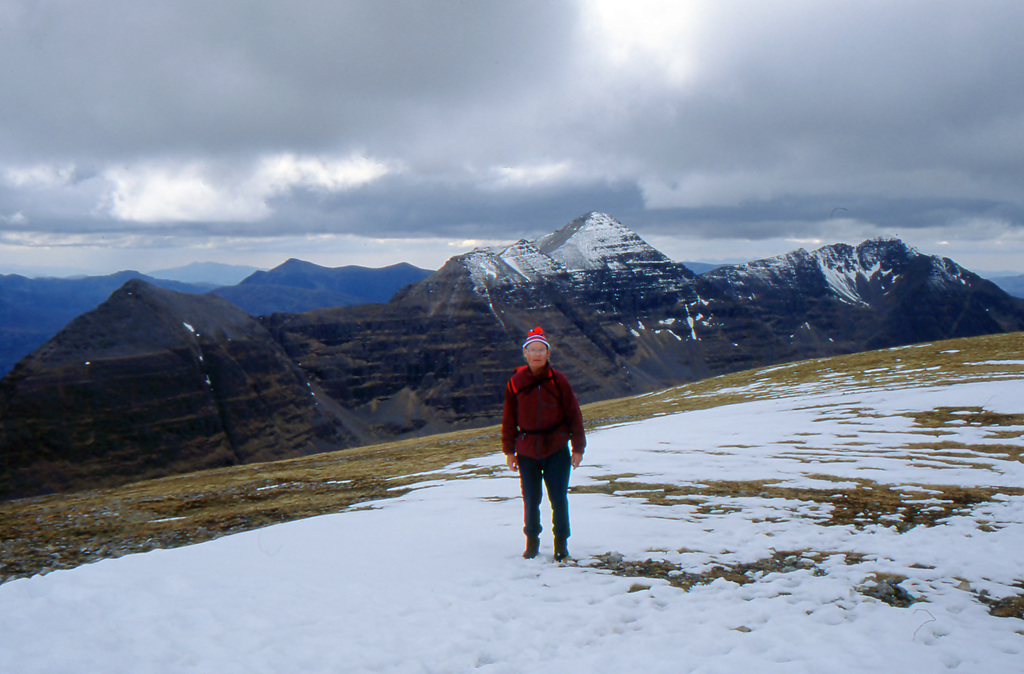 Jim between Ruadh Stac Mor and Spidean Coire nan Clach, Beinn Eighe.Laithach(The Grey One) behind.12th May 1996.