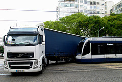 Tram collides with trailer of 2016 Volvo.