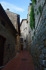 Italy, San Gimignano, Narrow Street in Medieval Town