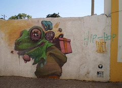 Intervention of Sainer on the wall of Urban Social Vegetables Orchard.