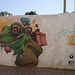 Intervention of Sainer on the wall of Urban Social Vegetables Orchard.