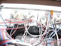 Oven with lots of wires and switches