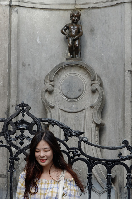 Manneken-Pis sur les cheveux