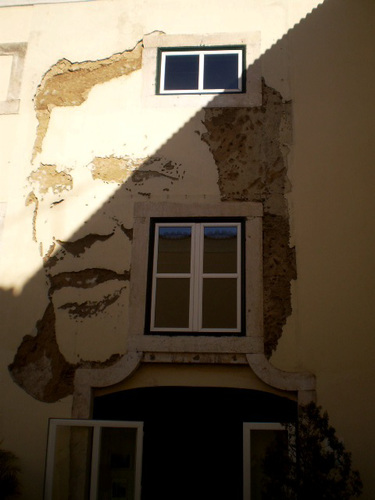 Portrait carved by Vhils.