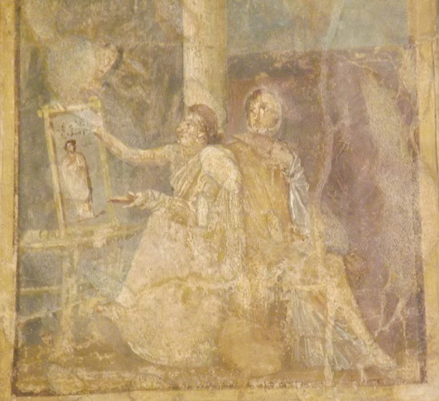 Detail of a Wall Painting with a Female Painter Painting Dionysos from the House of the Surgeon in Pompeii in the Naples Archaeological Museum, July 2012