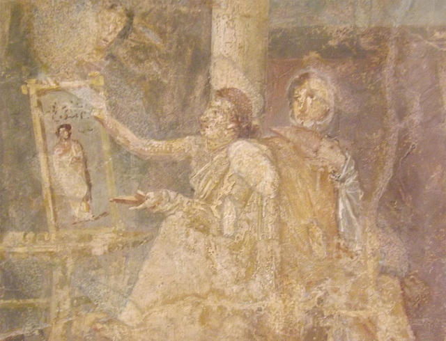 Detail of a Wall Painting with a Female Painter Painting Dionysos from the House of the Surgeon in Pompeii in the Naples Archaeological Museum, July 2012