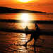 Water games at sunset of the beach Jimbaran, Bali