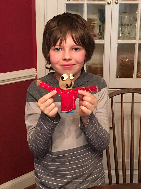Nephew showing off the doll he made himself