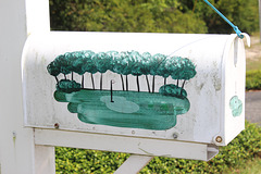 A mail box near our local Golf Club:)  painted to fit the area , uhh   and needs cleaning:))