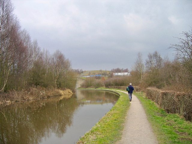 Coventry Canal passing beneath the M42 Motorway, with the traffic Jam