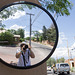 Self portrait in traffic mirror