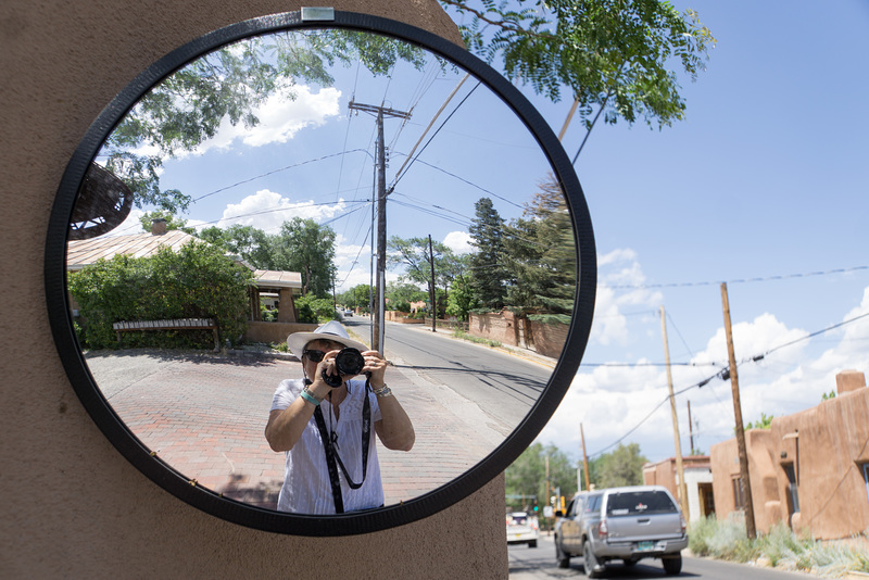 Self portrait in traffic mirror
