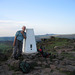 Trig Point on The Roaches (505m) with Shutlingsloe in the distance