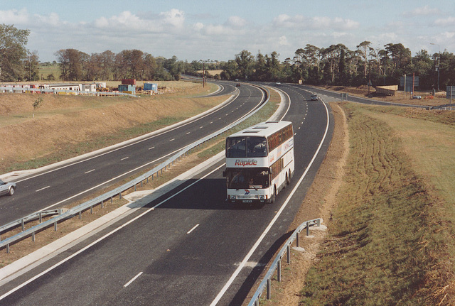 Ambassador Travel 915 (C915 BPW) on the new Red Lodge by-pass – 22 Sep 1991 (151-29) Ambassador Travel 915 (C915 BPW) on the new Red Lodge by-pass – 22 Sep 1991 (151-29)