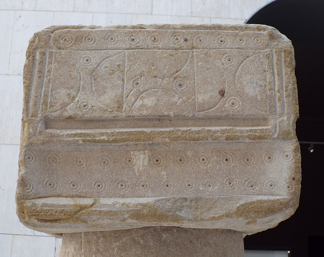 Detail of an Iberian Column with a Decorated Capital in the Archaeological Museum of Madrid, October 2022