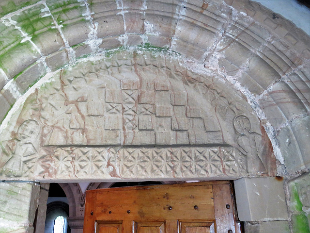 tissington church, derbs (19)early c12 tympanum, perhaps with adam and eve