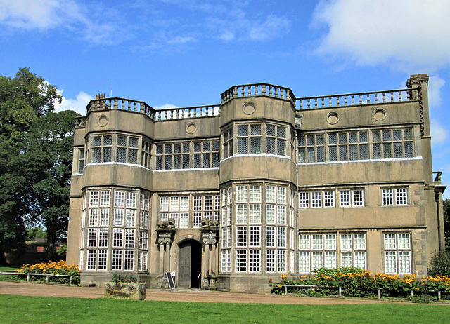 Asymmetrical House and the massive bay windows.