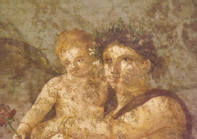 Detail of the Maenad and Cupid Wall Painting from the House of Caecilius Iucundus in Pompeii in the Naples Archaeological Museum, July 2012