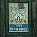 Three Horseshoes pub sign