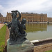 Two Children and a Cupid Statue with the Palace of Versailles, June 2013