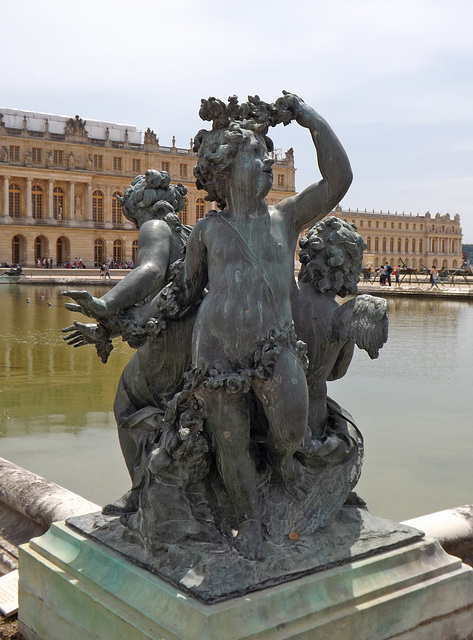 Two Children and a Cupid Statue in the Gardens of Versailles, June 2013