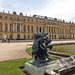 Child and Two Cupids Statue with the Palace of Versailles, June 2013