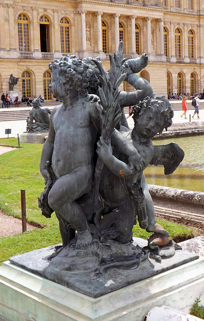 Child and Two Cupids Statue in the Gardens of Versailles, June 2013