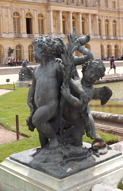 Child and Two Cupids Statue in the Gardens of Versailles, June 2013