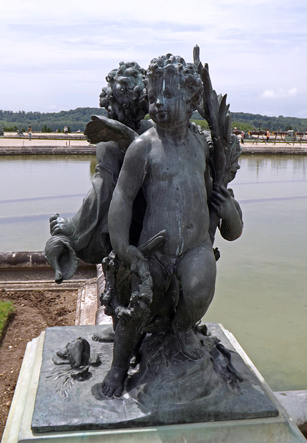 Child and Two Cupids Statue in the Gardens of Versailles, June 2013