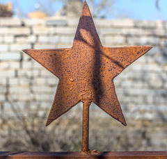 Rusty Star on a Memorial in an Islamic Cemetery